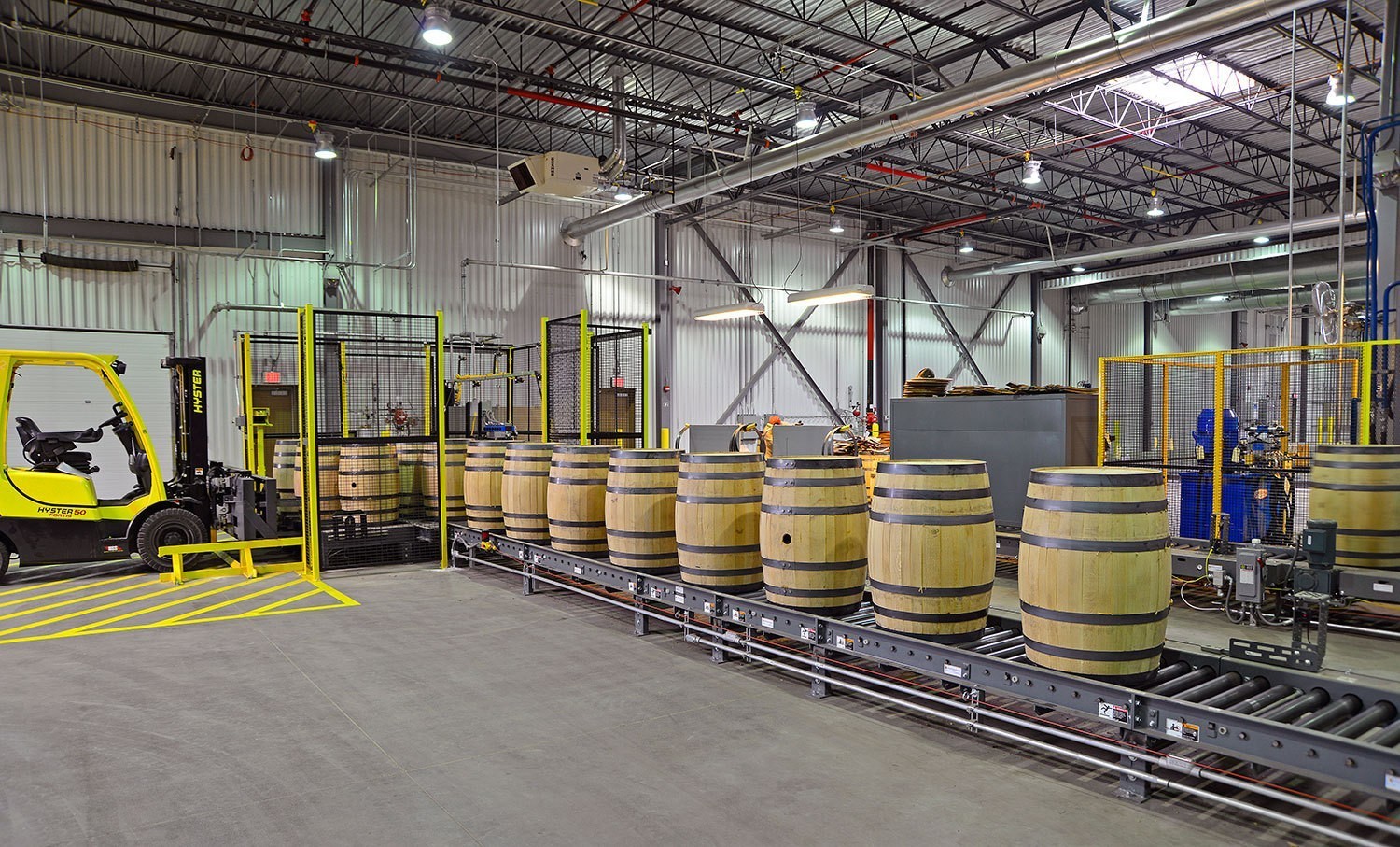 jack-daniels-cooperage-interior-barrel-assemblyline-in-a-row